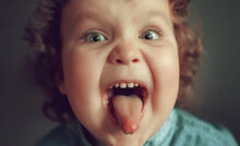 kid sticking out tongue