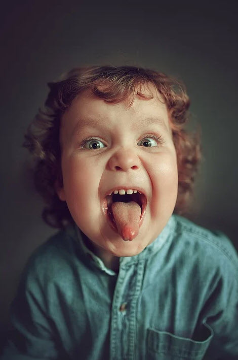 kid sticking out tongue