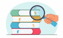 hand holding magnifying glass on books