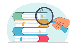 hand holding magnifying glass on books